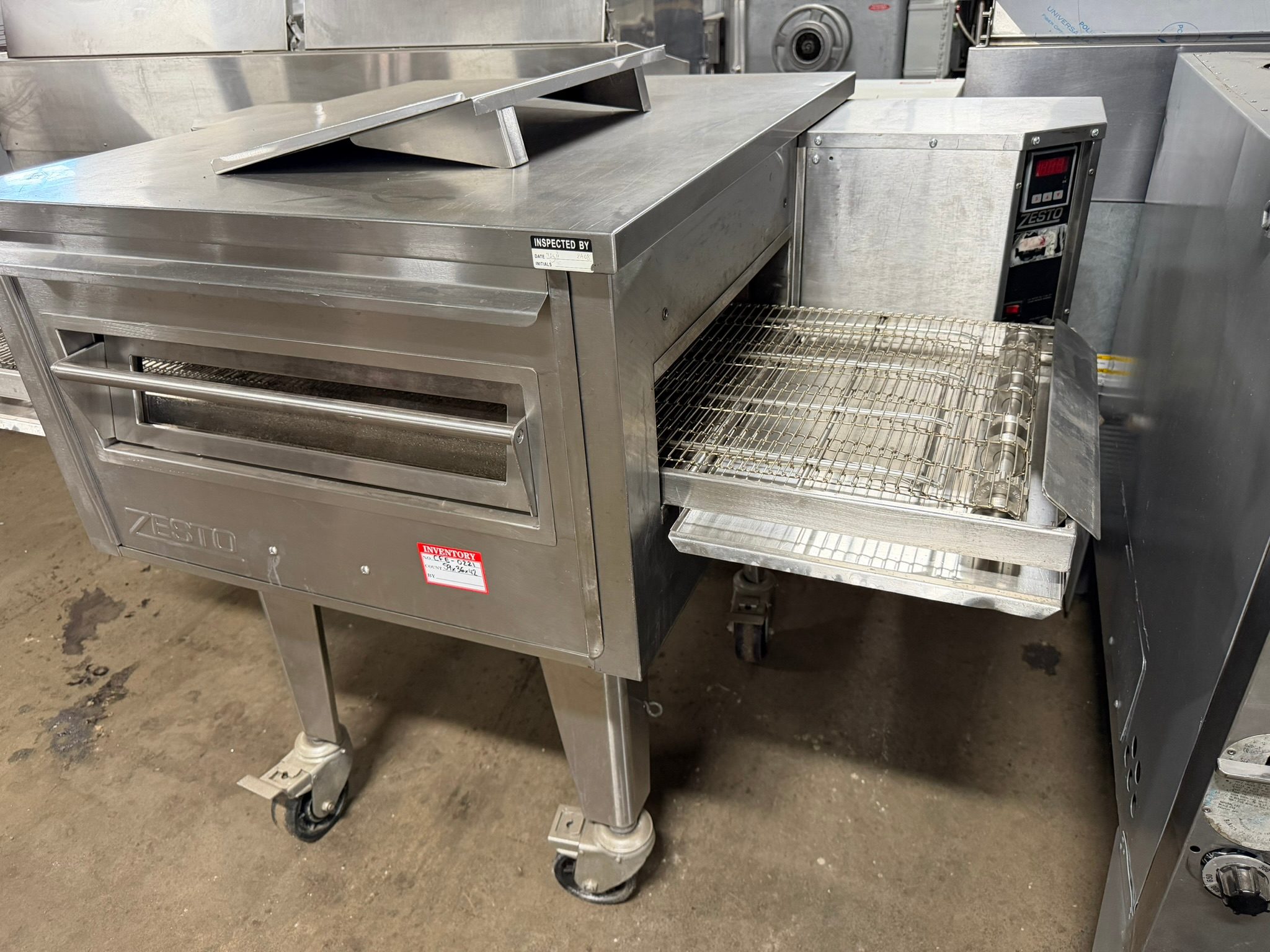 Zesto CG3018 Natural Gas Double Conveyor Pizza/Bake Oven, 18″ Wide Belt, 30″ Cook Chamber REFURBISHED CFE-0221 Zesto CG3018 Natural Gas Double Conveyor Pizza/Bake Oven, 18″ Wide Belt, 30″ Cook Chamber REFURBISHED CFE-0221